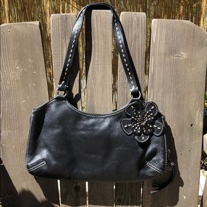 Black leather purse with flower